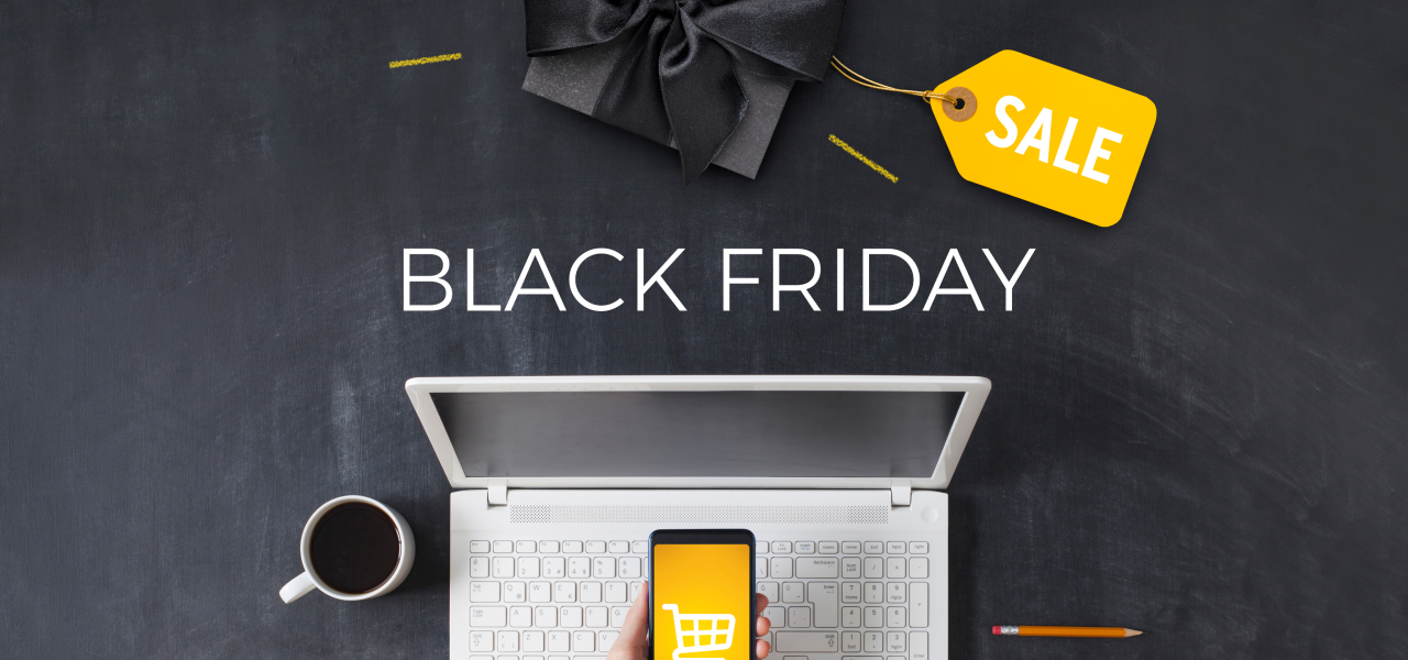 Laptop und Handy zum Online-Shopping am Black Friday